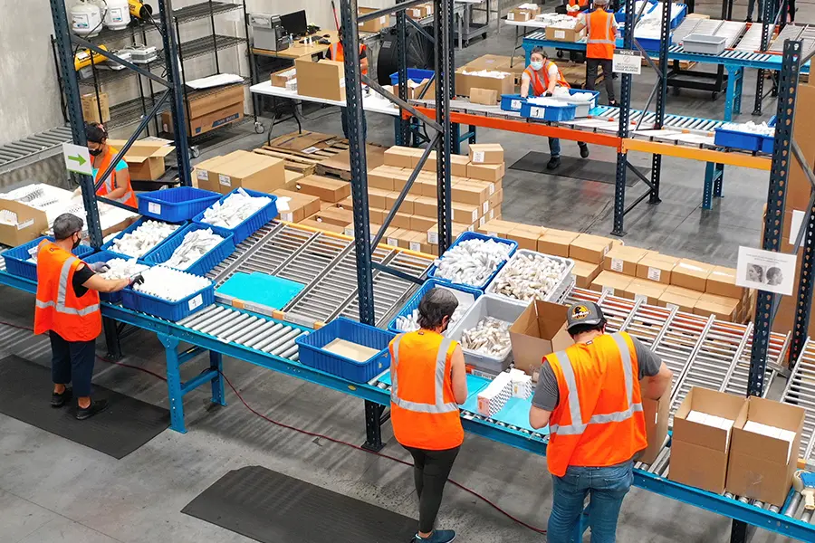 PGS360 warehouse workers assembling products