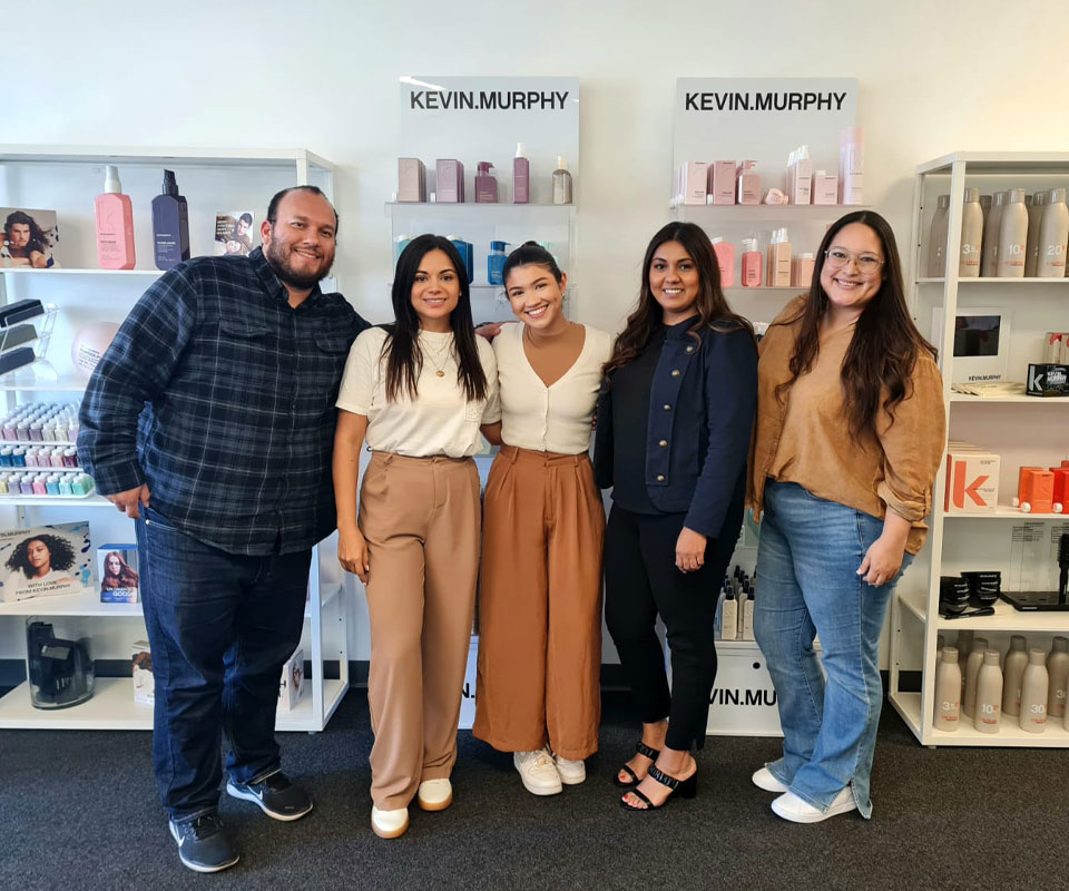 Staff smiling at Kevin Murphy